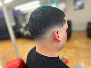Clean taper fade from the back